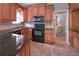 Well-appointed kitchen with dark granite countertops and modern appliances at 8321 Banks Mill Rd, Douglasville, GA 30135