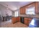 Well-designed kitchen with stainless steel appliances, dark countertops, and ample cabinet space at 8321 Banks Mill Rd, Douglasville, GA 30135