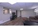 Comfortable living room with hardwood floors and ample seating at 8321 Banks Mill Rd, Douglasville, GA 30135
