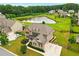 Overhead view capturing a home in a serene neighborhood, complete with a pond and well-maintained surroundings at 847 Rolling Hill, Kennesaw, GA 30152