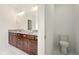 Bathroom showcasing a double vanity with granite countertop and a toilet at 847 Rolling Hill, Kennesaw, GA 30152