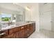 Bathroom featuring double sink vanity, granite countertops, and tiled floors at 847 Rolling Hill, Kennesaw, GA 30152