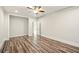 This bedroom features stylish wood floors and a ceiling fan for added comfort at 847 Rolling Hill, Kennesaw, GA 30152