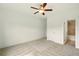 This bedroom has neutral carpet and a ceiling fan for extra comfort at 847 Rolling Hill, Kennesaw, GA 30152