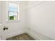 Walk in closet with carpet, shelving, and a window for natural light at 847 Rolling Hill, Kennesaw, GA 30152