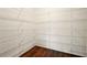 Ample closet space with wood floor and white-wire shelving for storage at 847 Rolling Hill, Kennesaw, GA 30152