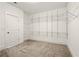 Walk-in closet with gray carpet and metal shelving to provide storage space at 847 Rolling Hill, Kennesaw, GA 30152