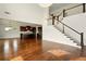 Open-concept living room flows into the kitchen with staircase detail at 847 Rolling Hill, Kennesaw, GA 30152