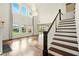 Bright living room with high ceilings, large windows and hardwood floors at 847 Rolling Hill, Kennesaw, GA 30152