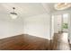 Bright living room featuring hardwood floors, high ceilings and elegant chandeliers at 847 Rolling Hill, Kennesaw, GA 30152