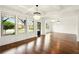 Bright living room featuring hardwood floors, natural light and elegant chandeliers at 847 Rolling Hill, Kennesaw, GA 30152