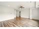 This living room offers recessed lighting, hardwood floors, and an airy feel at 847 Rolling Hill, Kennesaw, GA 30152
