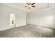 Spacious primary bedroom with ceiling fan, neutral carpet, and tray ceiling at 847 Rolling Hill, Kennesaw, GA 30152