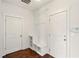 Clean mudroom features a bench, storage, and access to the garage and home interior at 847 Rolling Hill, Kennesaw, GA 30152
