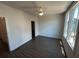 Bedroom with hardwood floors, a ceiling fan, and natural light from large windows at 924 Hughley Circle # 82, Atlanta, GA 30316