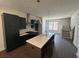 Modern kitchen with quartz countertops, stainless steel appliances, and a large island with seating at 924 Hughley Circle # 82, Atlanta, GA 30316