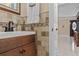 Bathroom vanity with modern fixtures, decorative tile work, and a warm, inviting atmosphere at 212 Lakeview Dr, Newborn, GA 30056