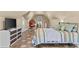 Spacious bedroom featuring unique flooring, neutral walls, and ample natural light at 212 Lakeview Dr, Newborn, GA 30056