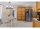 Eat-in kitchen featuring stainless steel appliances and lots of cabinet space at 212 Lakeview Dr, Newborn, GA 30056