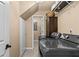 Well-lit laundry room with modern washer and dryer, storage shelves, and neutral color at 212 Lakeview Dr, Newborn, GA 30056