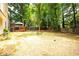 Spacious backyard with play set and deck area at 2568 Redfield Dr, Norcross, GA 30071