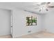 Light and airy bedroom featuring natural light and a ceiling fan at 2568 Redfield Dr, Norcross, GA 30071