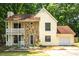 Charming two-story home with stone accents and a welcoming front porch and one car garage at 2568 Redfield Dr, Norcross, GA 30071