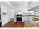Bright kitchen features granite countertops, stainless steel appliances, and white cabinetry at 2568 Redfield Dr, Norcross, GA 30071
