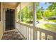Charming covered porch with a view of the front yard and neighborhood at 2568 Redfield Dr, Norcross, GA 30071