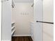 Well-organized walk-in closet with built-in shelving and drawers for ample storage at 2568 Redfield Dr, Norcross, GA 30071