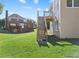 Beautiful backyard features lush green grass and a deck with stairs for access at 3226 Masters Pass Ln, Snellville, GA 30039