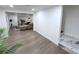 Finished basement area with hardwood floors, open layout, and a modern design at 3226 Masters Pass Ln, Snellville, GA 30039