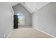 Bedroom featuring a cathedral ceiling and an arched window at 3226 Masters Pass Ln, Snellville, GA 30039