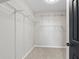 Walk in closet with installed shelving at 3226 Masters Pass Ln, Snellville, GA 30039