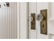 Detailed view of antique-style door knobs on white-painted doors, adding a touch of vintage elegance at 67 Trammell Sw St, Marietta, GA 30064