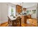 Bright and airy kitchen with hardwood floors and an adjacent dining area at 67 Trammell Sw St, Marietta, GA 30064