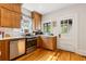 Well-equipped kitchen featuring stainless steel appliances, wooden cabinetry, and great natural light at 67 Trammell Sw St, Marietta, GA 30064