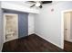 Bedroom featuring dark hardwood floors, natural light, and barn door entry to bathroom at 1110 Mcdaniel Sw St, Atlanta, GA 30310