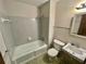 Bathroom featuring a tile shower/tub combo, toilet and vanity at 3100 Karen Ne Ln, Marietta, GA 30062