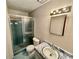 Bathroom featuring a tile shower, toilet and marble vanity at 3100 Karen Ne Ln, Marietta, GA 30062