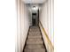 Hallway view of stairs with unique wallpaper at 3100 Karen Ne Ln, Marietta, GA 30062