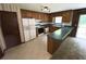 Eat-in kitchen with wood cabinets, countertops and exterior access at 3100 Karen Ne Ln, Marietta, GA 30062