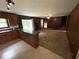 Kitchen with view into living room and patio doors at 3100 Karen Ne Ln, Marietta, GA 30062