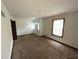 Bright living room features neutral carpet and a sunny window at 3100 Karen Ne Ln, Marietta, GA 30062