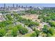 Aerial view featuring lush greenery, city skyline, and a glimpse of a stadium at 701 Cameron M Alexander Nw Blvd, Atlanta, GA 30318