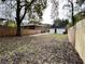 Wide view of backyard area with wooden fence and grassy area at 701 Cameron M Alexander Nw Blvd, Atlanta, GA 30318