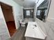Bathroom with tile floors and modern fixtures at 701 Cameron M Alexander Nw Blvd, Atlanta, GA 30318