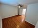 Bedroom features a ceiling fan, hardwood floors and white walls at 701 Cameron M Alexander Nw Blvd, Atlanta, GA 30318