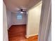 Bedroom with hardwood floors, white walls, a ceiling fan and a closet at 701 Cameron M Alexander Nw Blvd, Atlanta, GA 30318