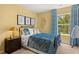 Bedroom with a decorative color scheme, a large window and exterior views at 1315 Aura Ln, Lawrenceville, GA 30045